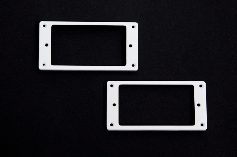MARCOS CURVADOS PARA PASTILLAS HUMBUCKER BLANCOS